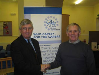 Dr Hywel Francis MP (left) with the Chair of Neath Port Talbot Carers Action Movement, Mr Ray Thomas, at a recent carers event