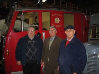 Dr Francis is pictured with Society Secretary, Malcolm Evans, and Chairman, Raymond Evans, in front of a 1950's Dennis make fire engine that was based in Briton Ferry