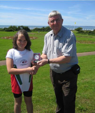 Dr Francis congratulates Ffion on winning her Gold Medal.