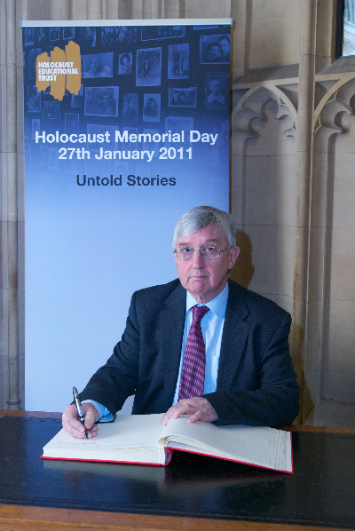 Dr Hywel Francis MP honours the ‘Untold Stories’ of the Holocaust by signing Book of Commitment