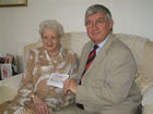 Hywel  celebrating Mrs Aitken's centenary birthday