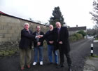 Hywel (left) in the back lane with (left to right) Mr Leighton Morgan, Mr Alan Stephens and Councillor Mike Harvey at the new surface of the back lane at Woodland Road, Skewen